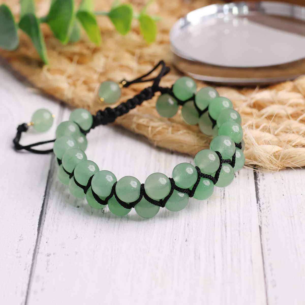 Handmade Green Aventurine Adjustable Thread Bracelet with 8 mm round beads, showcasing its vibrant green color and adjustable design.