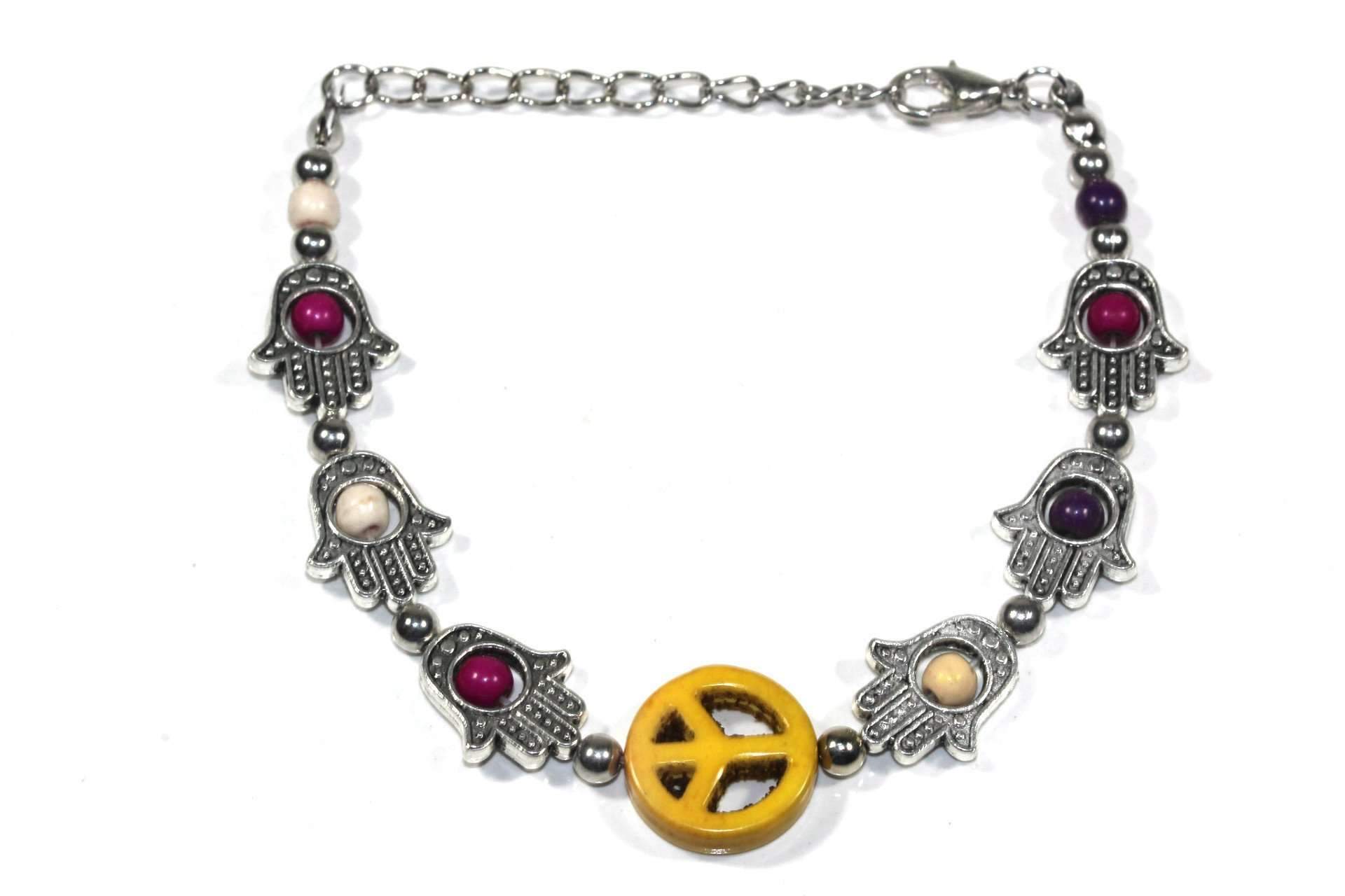 A stylish silver tone bracelet featuring Hamsa Hand and peace charms, adorned with colorful beads in a boho style.