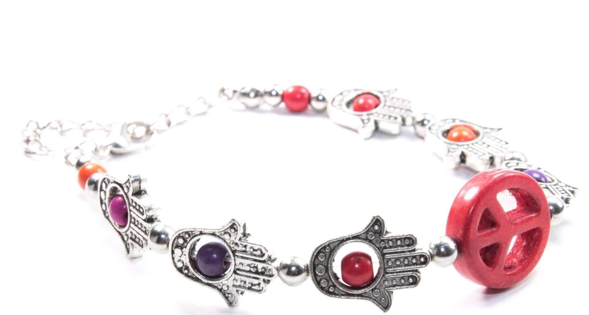 A stylish silver tone bracelet featuring Hamsa Hand and peace charms, adorned with colorful beads in a boho style.