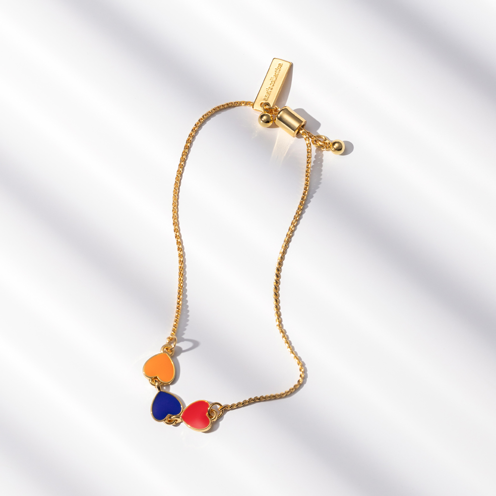 Hearts Bracelet by Anet's Collection featuring gold plated brass chain and tricolor enamel hearts representing the Armenian flag.