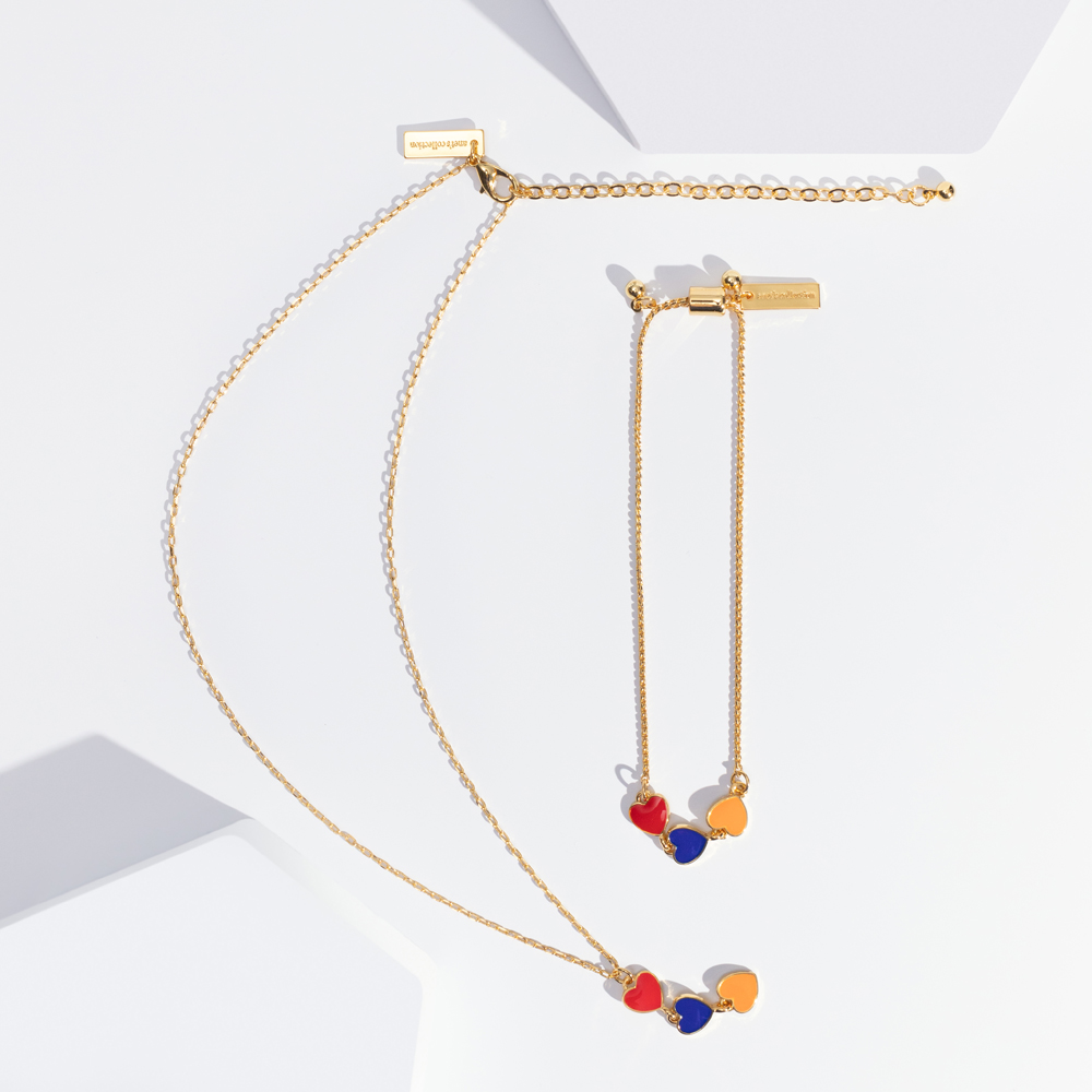 Hearts Bracelet by Anet's Collection featuring gold plated brass chain and tricolor enamel hearts representing the Armenian flag.