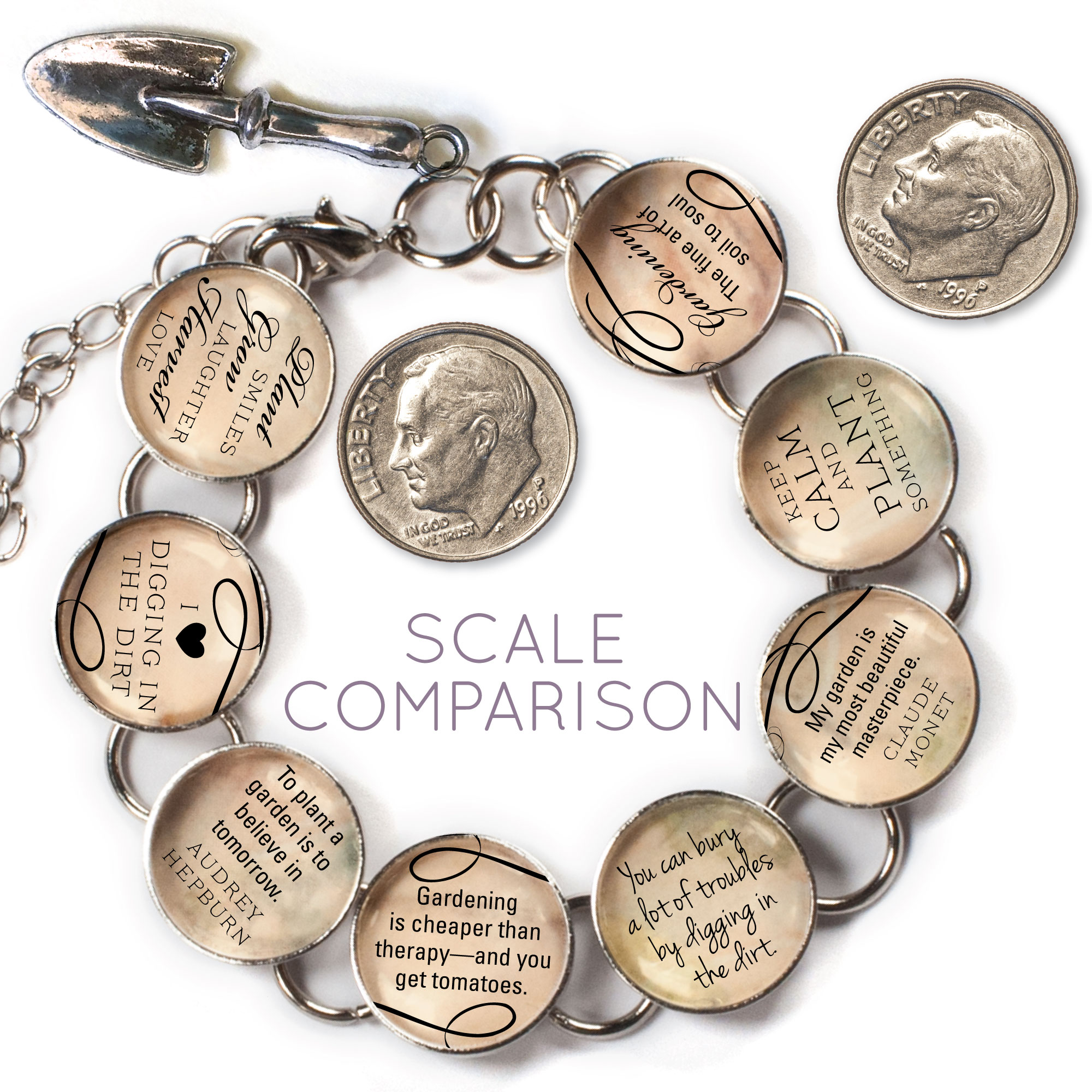 A silver charm bracelet featuring eight glass charms with gardening quotes and a dangling garden spade charm, elegantly displayed in a lavender organza bag.