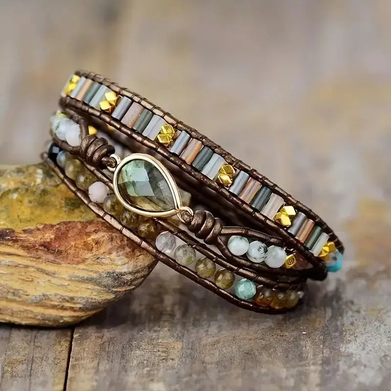 A beautiful Labradorite & Rhinestone Wrap Bracelet featuring genuine labradorite stones and sparkling rhinestones in a teardrop pattern.