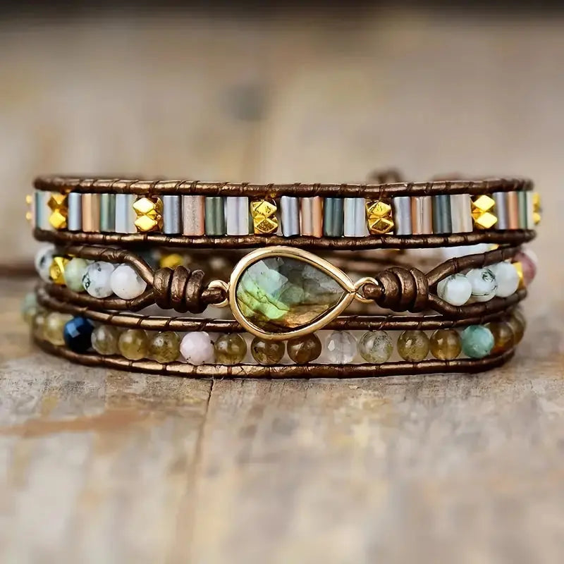 A beautiful Labradorite & Rhinestone Wrap Bracelet featuring genuine labradorite stones and sparkling rhinestones in a teardrop pattern.