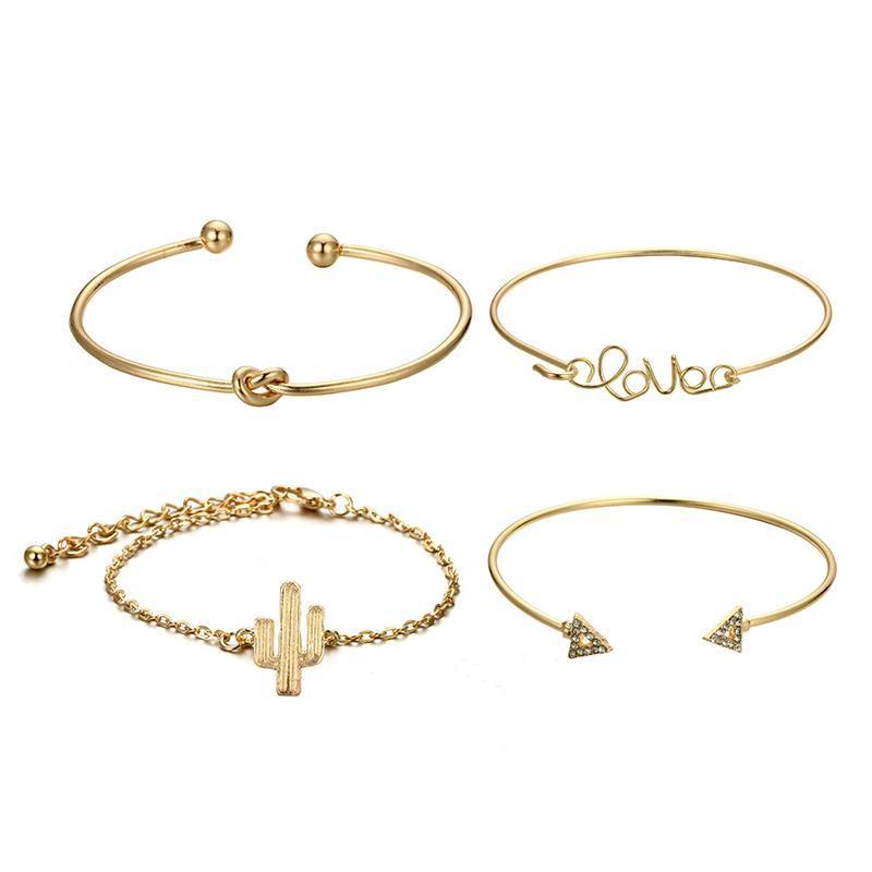 A stylish Love Bracelet Stack featuring four unique bracelets with charms: 'love', a knot, a cactus, and two arrows, made from crystal and zinc alloy.