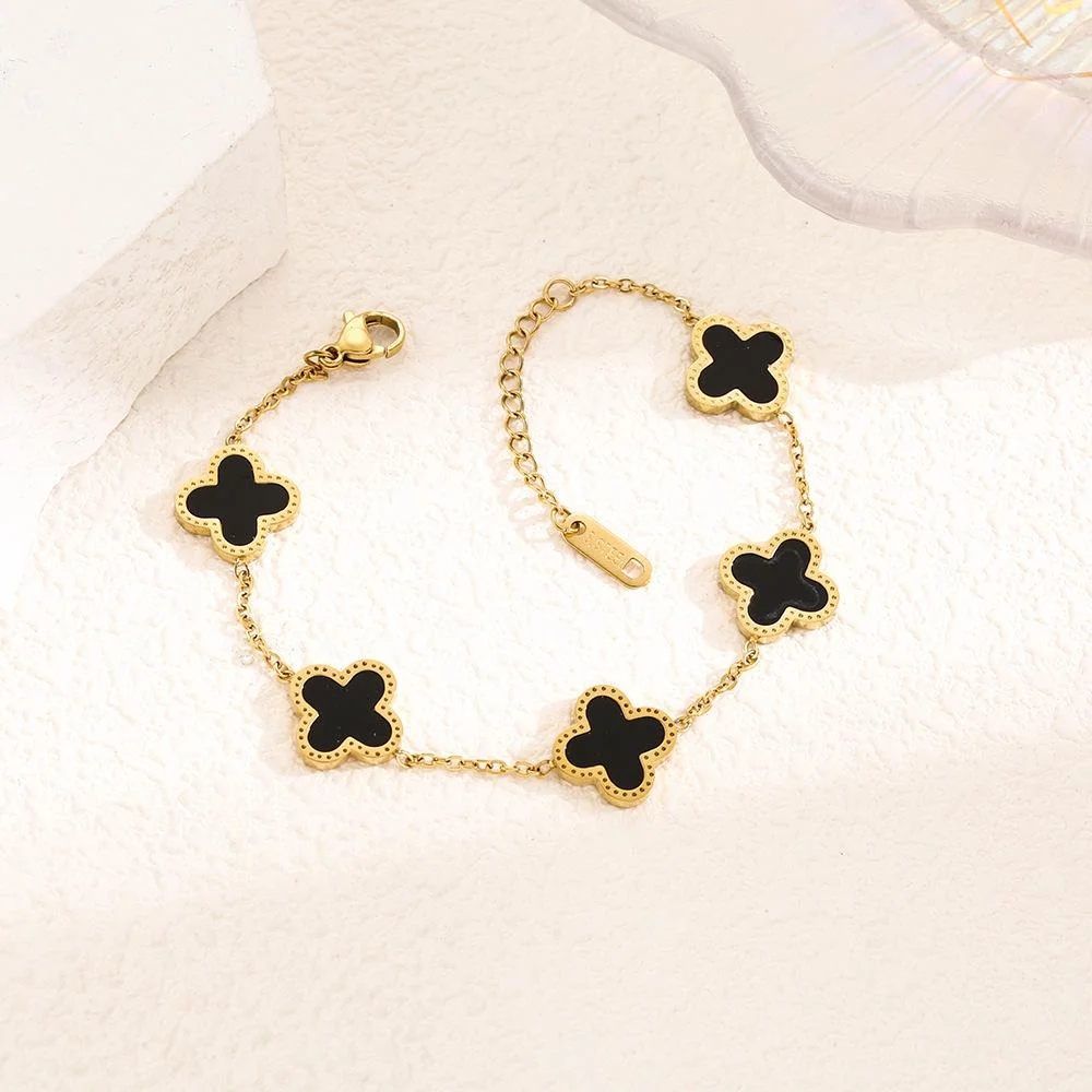 Elegant Lucky Four-leaf Clover Bracelet made of mother-of-pearl and 18K gold, featuring a unique double-layer design.