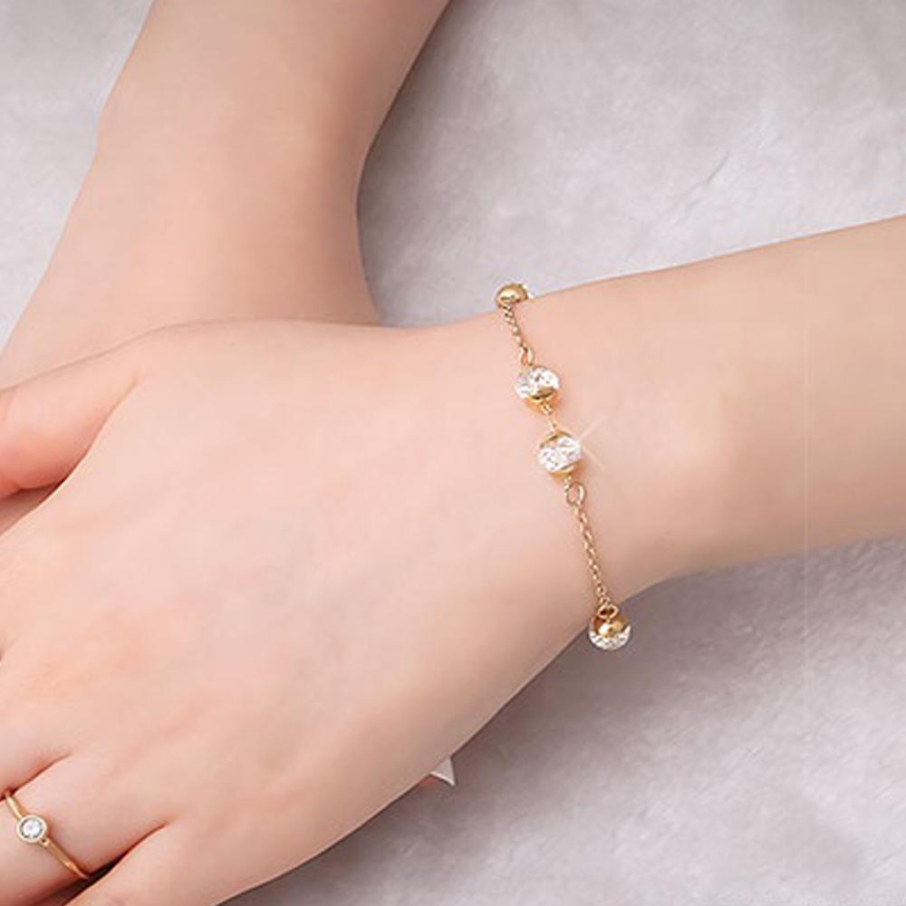 Madison 14K Gold Plated Chain Bracelet with Swarovski crystals, showcasing its elegant design and adjustable length.