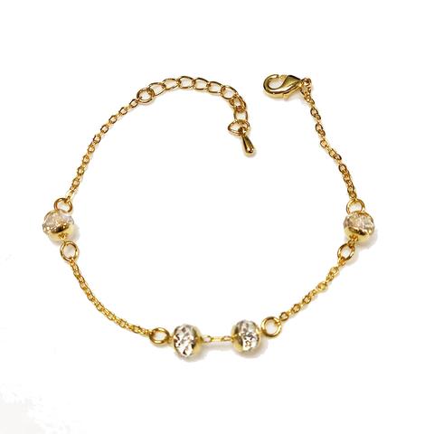 Madison 14K Gold Plated Chain Bracelet with Swarovski crystals, showcasing its elegant design and adjustable length.