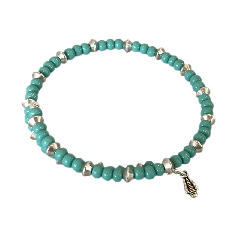 Mia Wrap Bracelet in silver featuring navy beads, elegantly designed for versatile wear.