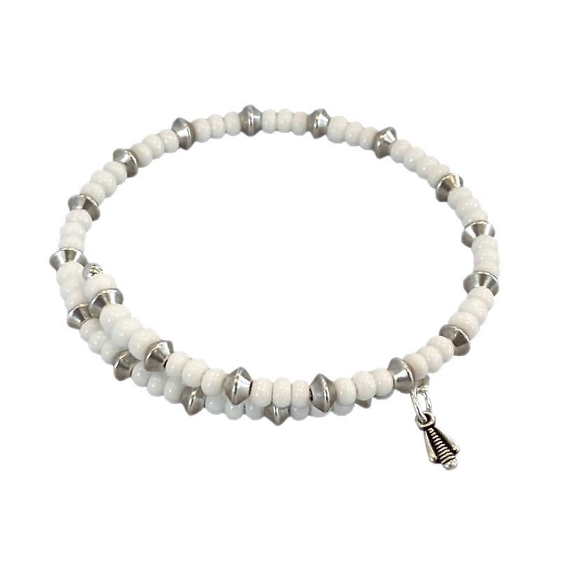 Mia Wrap Bracelet in silver featuring navy beads, elegantly designed for versatile wear.