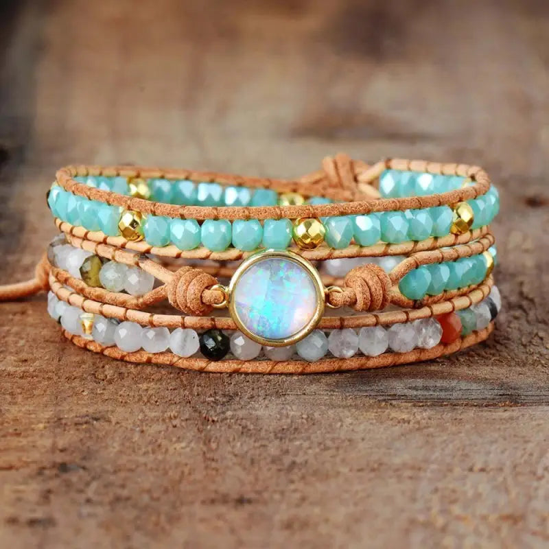 A beautifully handcrafted Opal Bracelet featuring iridescent opal gemstones in a bohemian style, showcasing vibrant colors and unique patterns.