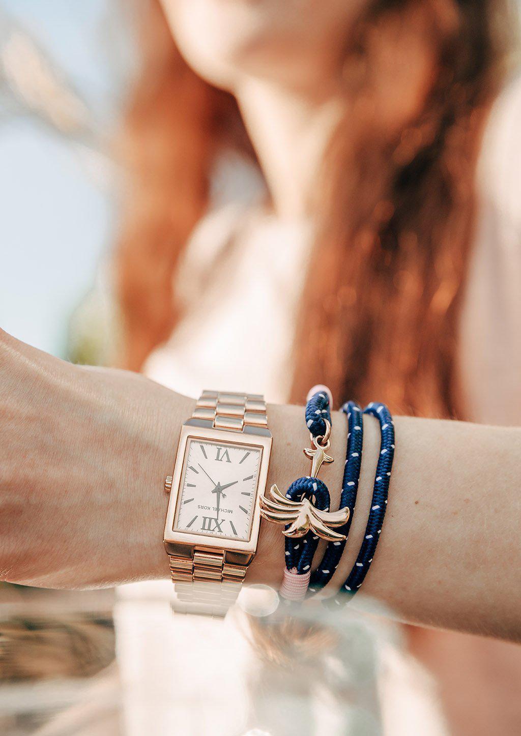 Palmband Daybreak Triple bracelet featuring a blue and pink nylon band with a unique rose palm tree anchor link.