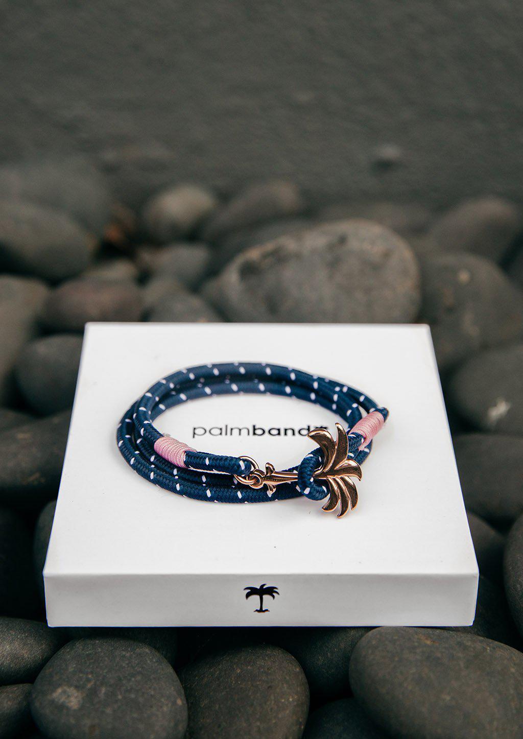 Palmband Daybreak Triple bracelet featuring a blue and pink nylon band with a unique rose palm tree anchor link.