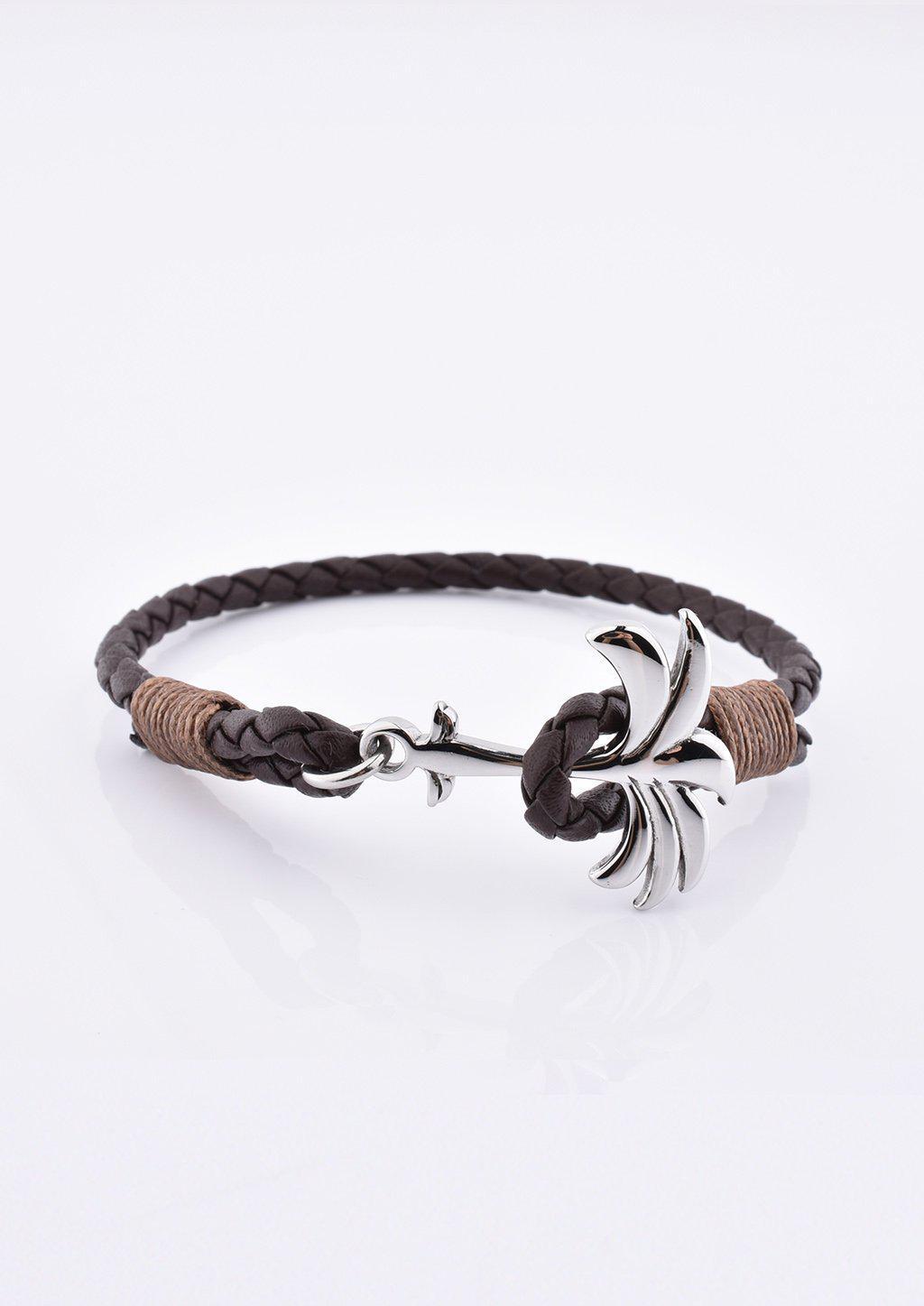 Oakland Palm Band featuring a brown leather strap and silver palm tree anchor, symbolizing happiness and tranquility.