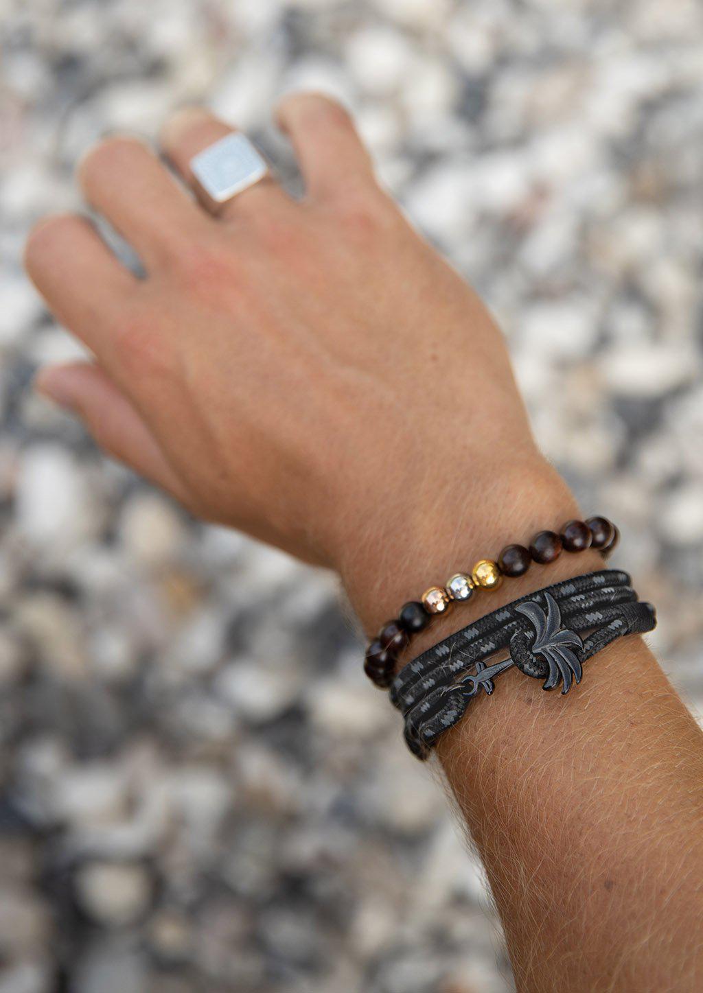 Palmband - Phantom Black - Triple bracelet featuring a black palm tree anchor and a durable black and gray nylon band.