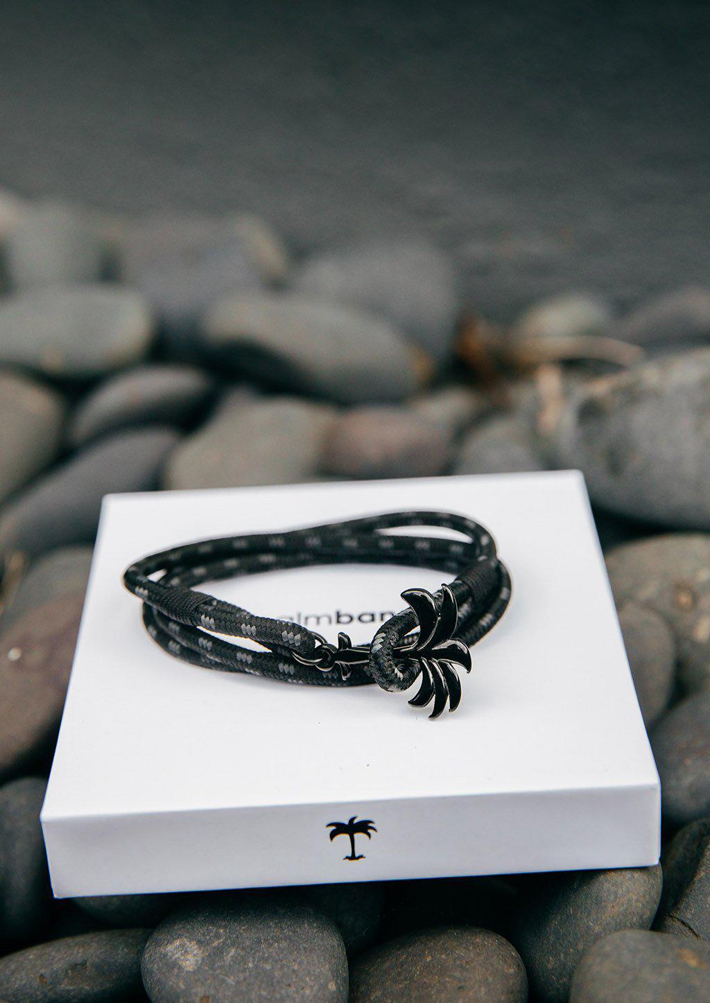 Palmband - Phantom Black - Triple bracelet featuring a black palm tree anchor and a durable black and gray nylon band.