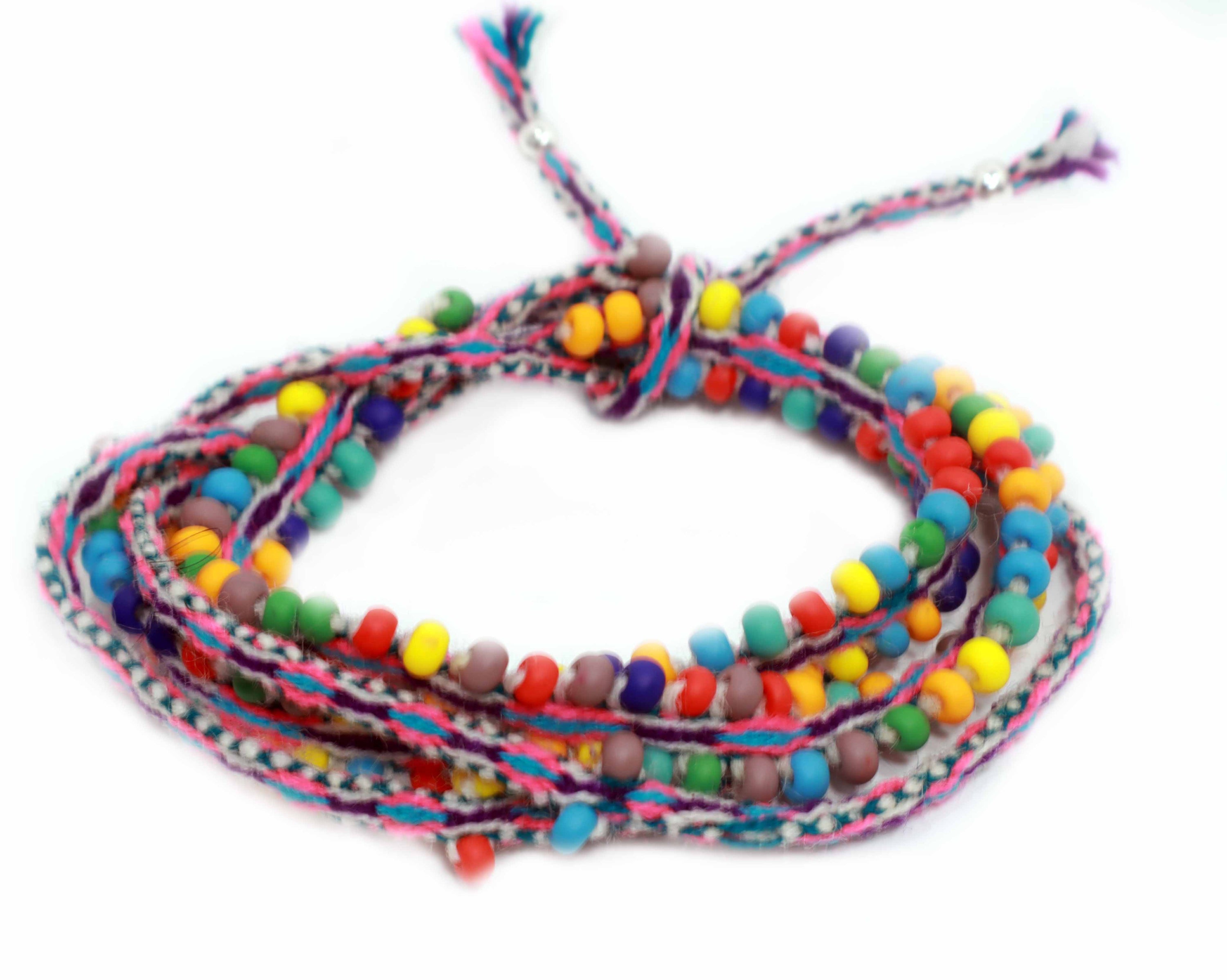 Colorful Rainbow Beaded Cotton Candy Tassel Tie Wraps showcasing intricate design and craftsmanship.