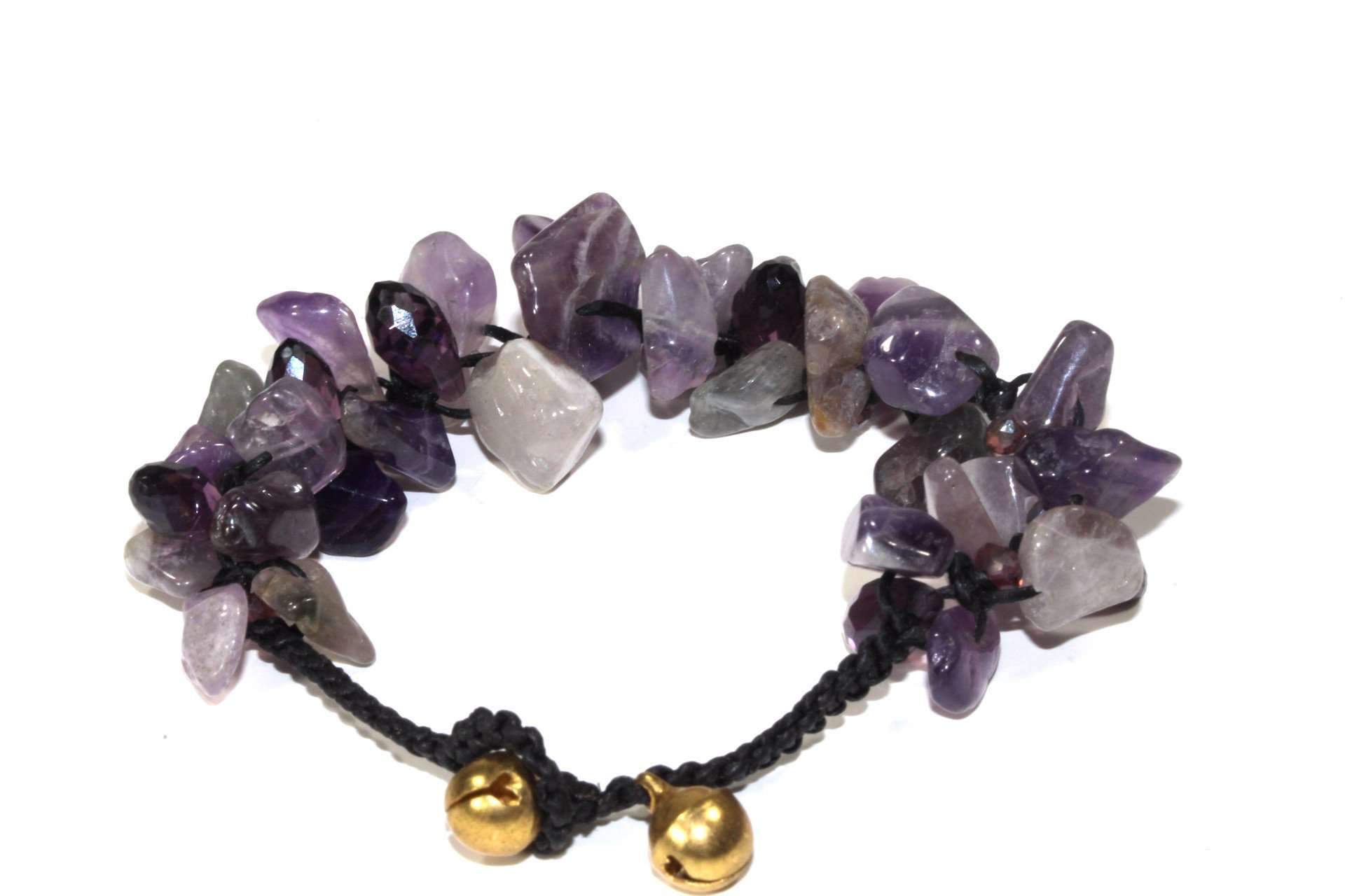 Handcrafted Raw Amethyst Stone Bracelet with jingle bell closure on a black cotton chord, showcasing vibrant purple stones.