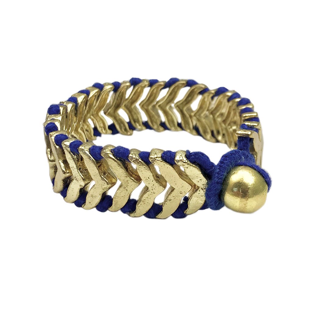 The Rina Temple Bracelet featuring intricate handwoven metal beads and cotton threads, showcasing a blend of traditional Indian and modern bohemian design.