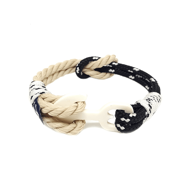 Sailor Nautical Bracelet Reef Knot featuring black and beige sailing ropes with a wooden anchor, elegantly displayed on a wrist.