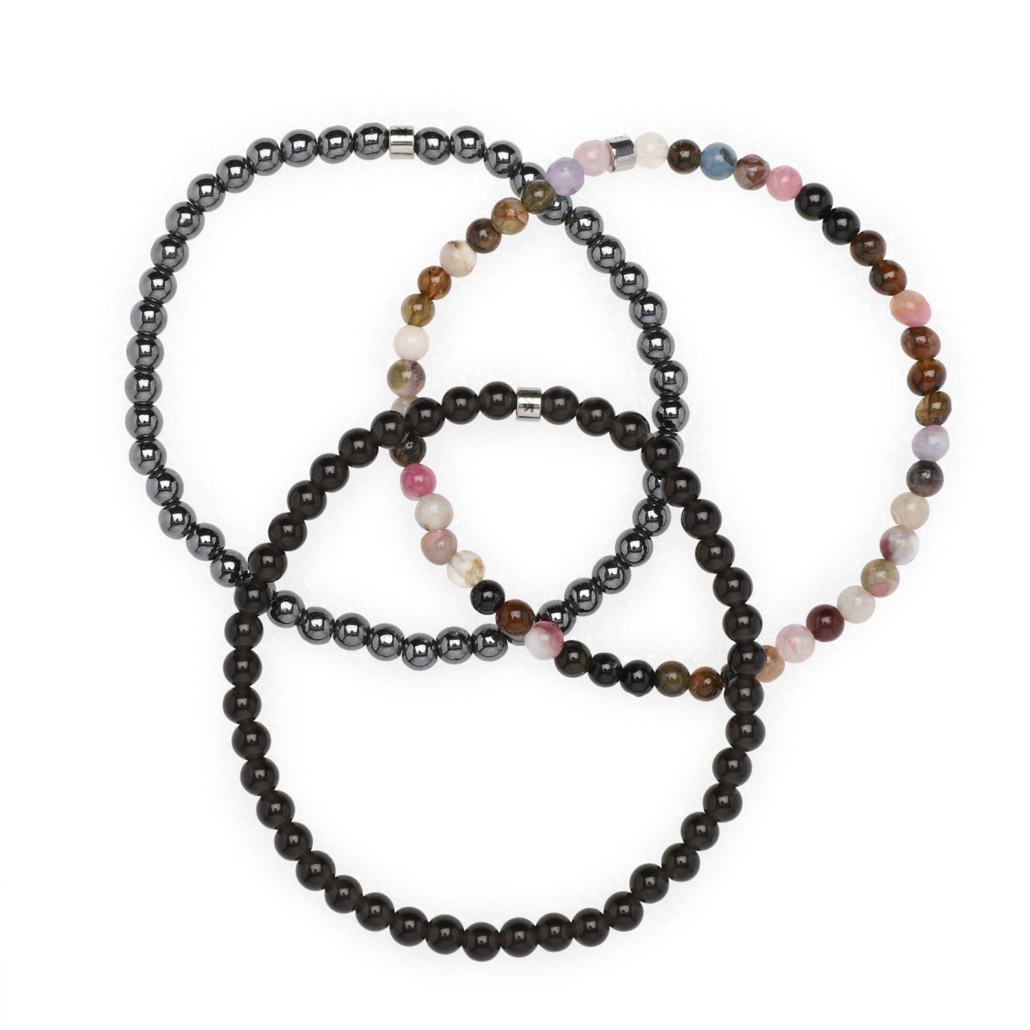 Set de 3 mini bracelets 'Sécurité' avec tourmaline multicolore, hématite et obsidienne noire, sur fond neutre.