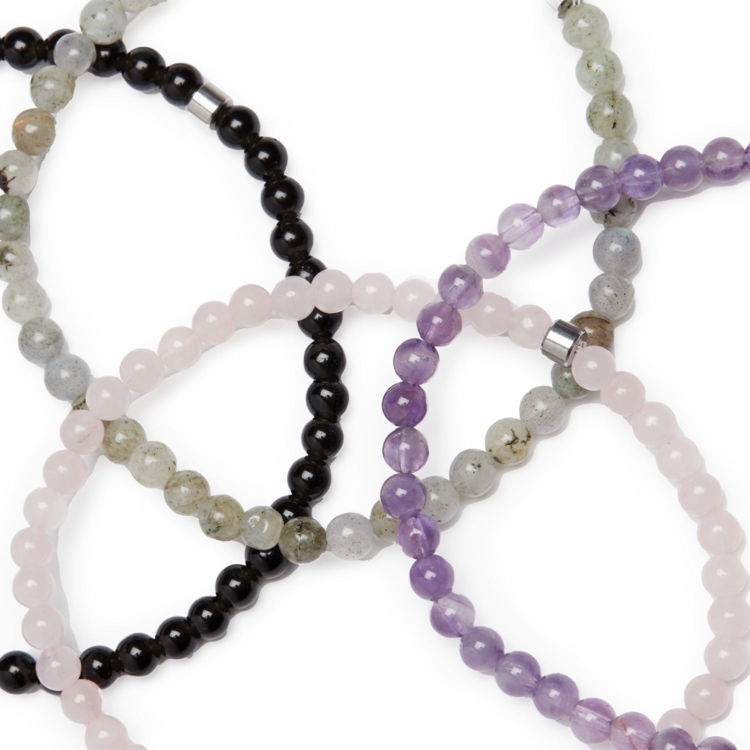 Set de 4 Mini Bracelets "Mes Préférés" avec Labradorite, Quartz Rose, Améthyste et Obsidienne Noire, présentés sur un fond neutre.