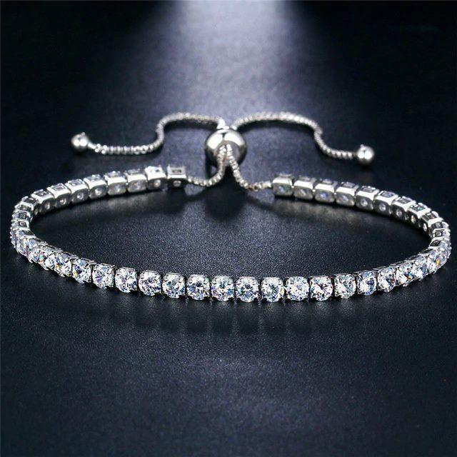 A beautiful Simple Tennis Bracelet featuring adjustable length, made of high-quality zinc alloy with sparkling cubic zirconia stones.