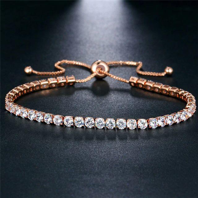 A beautiful Simple Tennis Bracelet featuring adjustable length, made of high-quality zinc alloy with sparkling cubic zirconia stones.