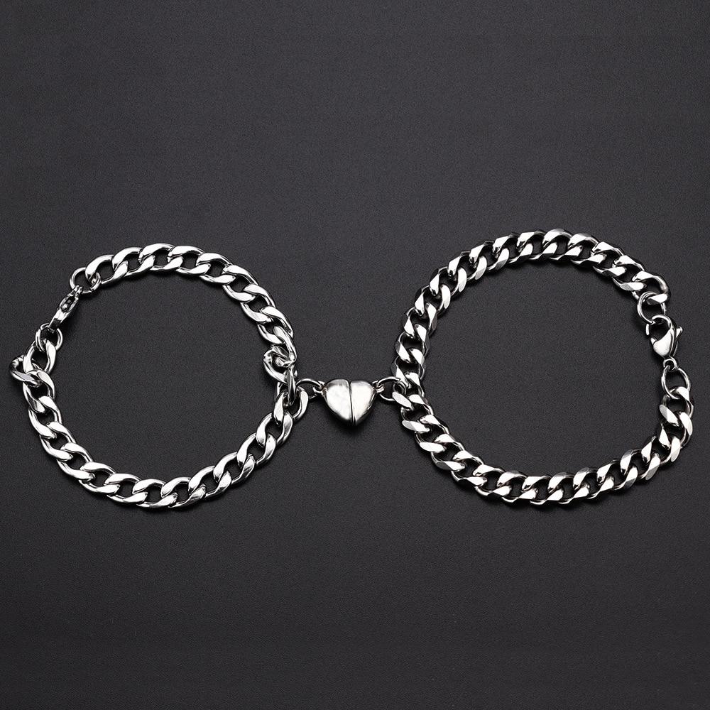 Stainless Steel Couple Bracelets featuring Magnetism Heart Charm and Cuba Chain design, showcasing elegance and connection.