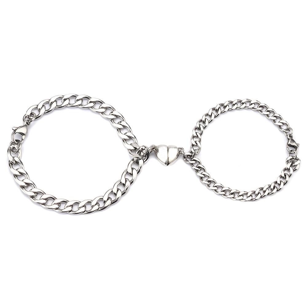 Stainless Steel Couple Bracelets featuring Magnetism Heart Charm and Cuba Chain design, showcasing elegance and connection.