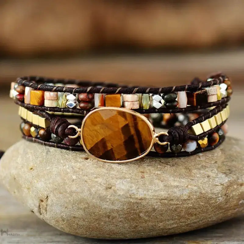 A stylish Tiger Eye Wrap Bracelet featuring unique golden-hued tiger's eye stones, showcasing its bohemian elegance.