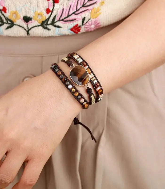 A stylish Tiger Eye Wrap Bracelet featuring unique golden-hued tiger's eye stones, showcasing its bohemian elegance.