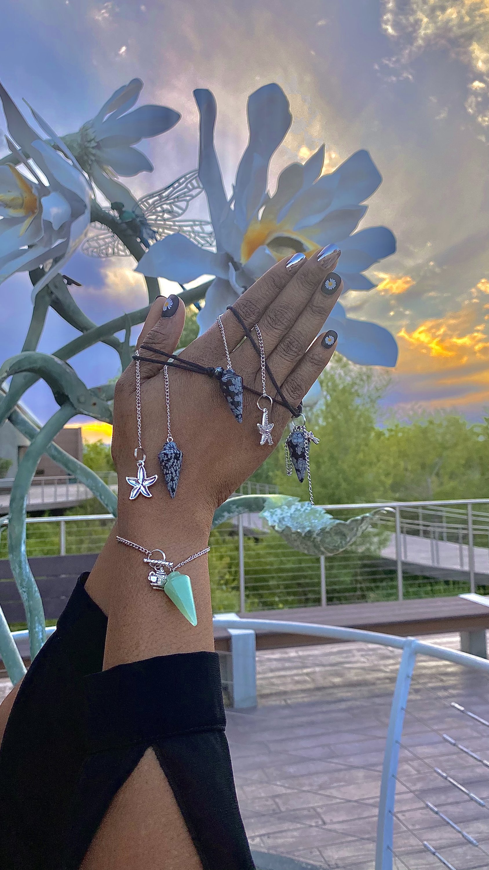 Tigers Eye Dowsing Pendulum and Bracelet showcasing golden yellow and deep yellow-brown hues with black stripes, symbolizing strength and grounding.