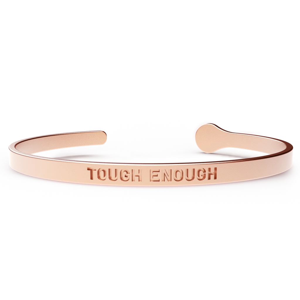 TOUGH ENOUGH bracelet made of hypoallergenic stainless steel with a 24k gold coating, showcasing its elegant design and durability.