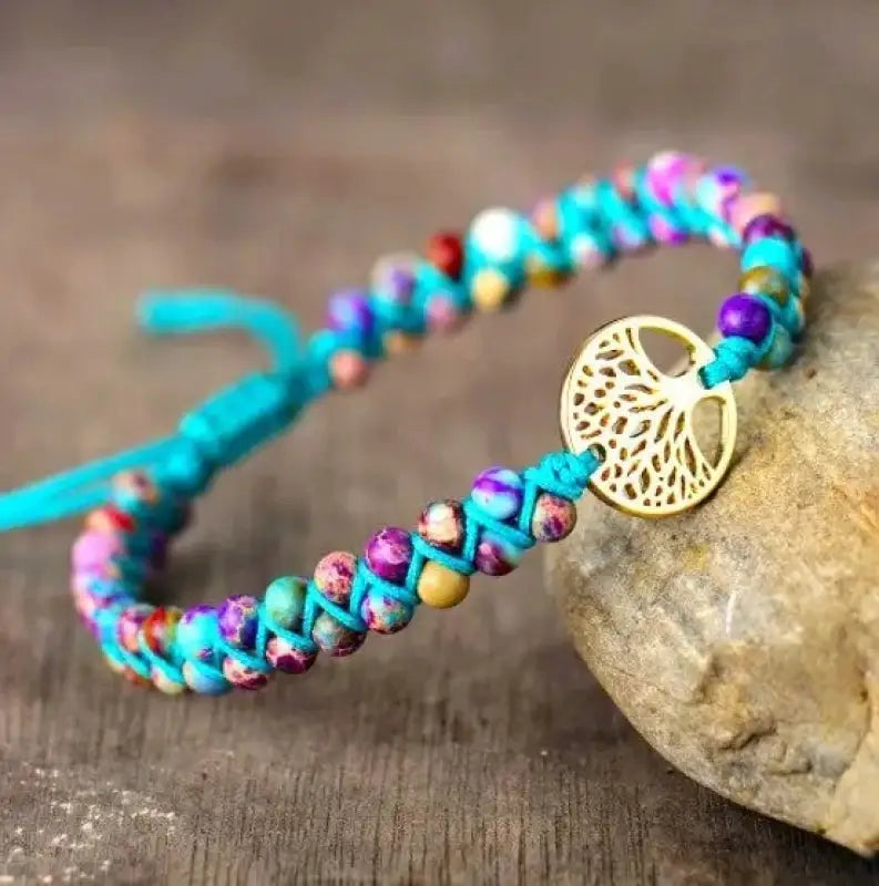 Tree of Life Imperial Jasper Bracelet featuring genuine Imperial Jasper stones and a decorative Tree of Life charm.