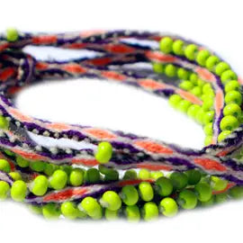 Washed Out Lime Beaded Tie Wraps featuring vibrant electric orange and purple colors, handwoven alpaca blend textile, and Czech beads.