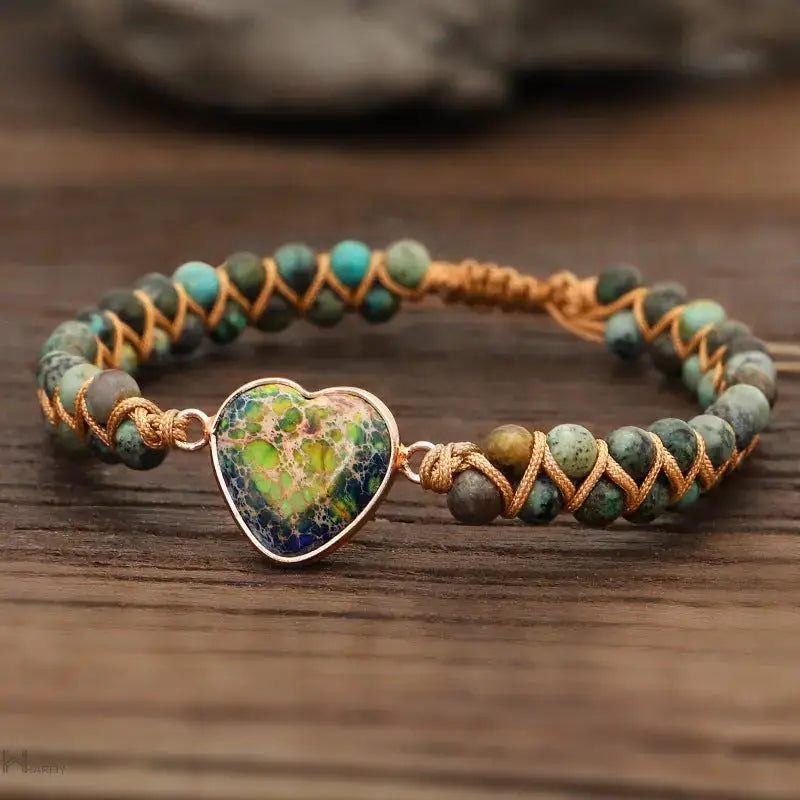 Wild Jasper Heart Charm Bracelet featuring a heart charm and intricate macrame design, made with semi-precious stones.