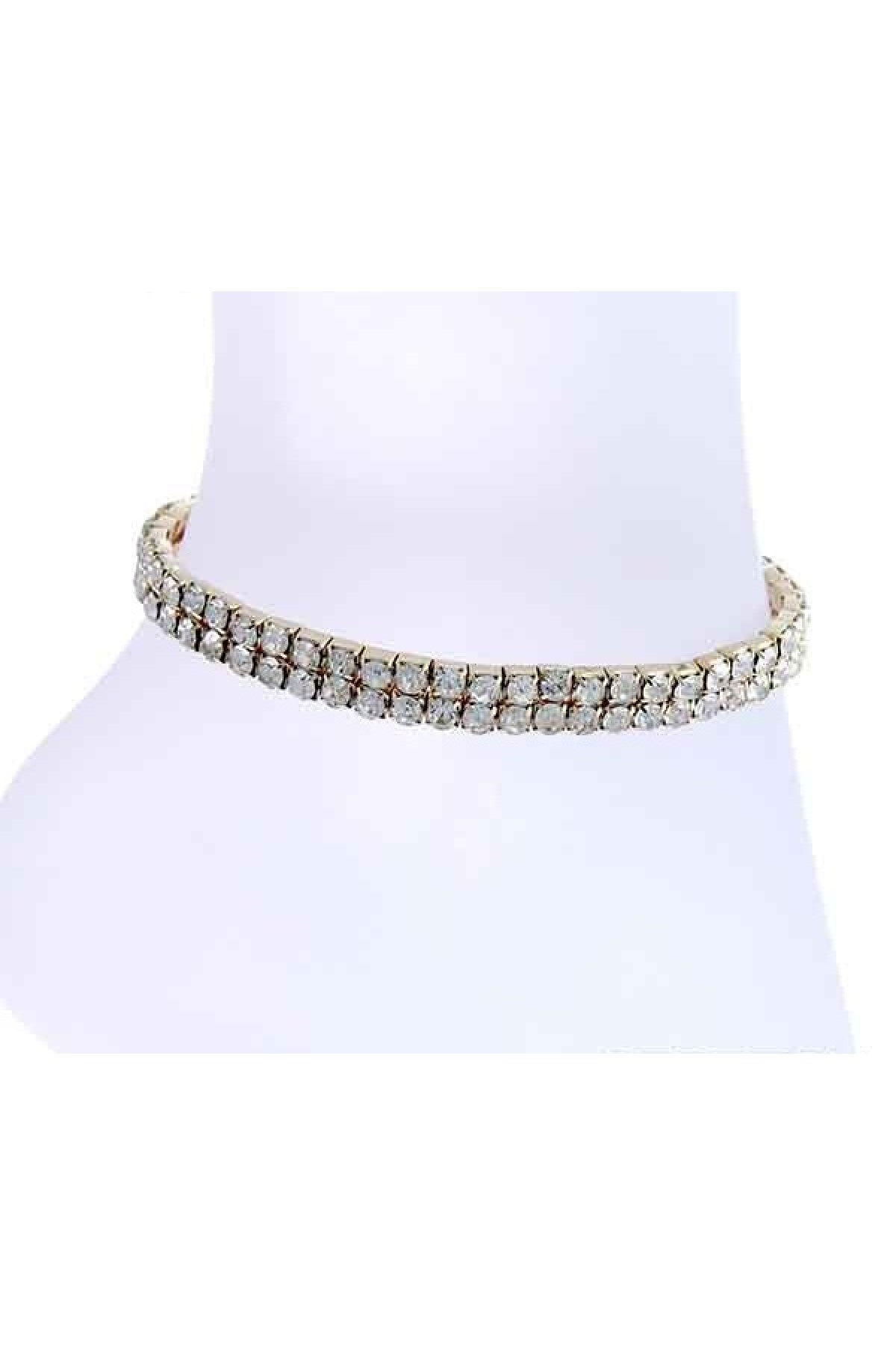 A stylish 2 lined crystal anklet with a stretch band, showcasing sparkling crystals on a delicate design.