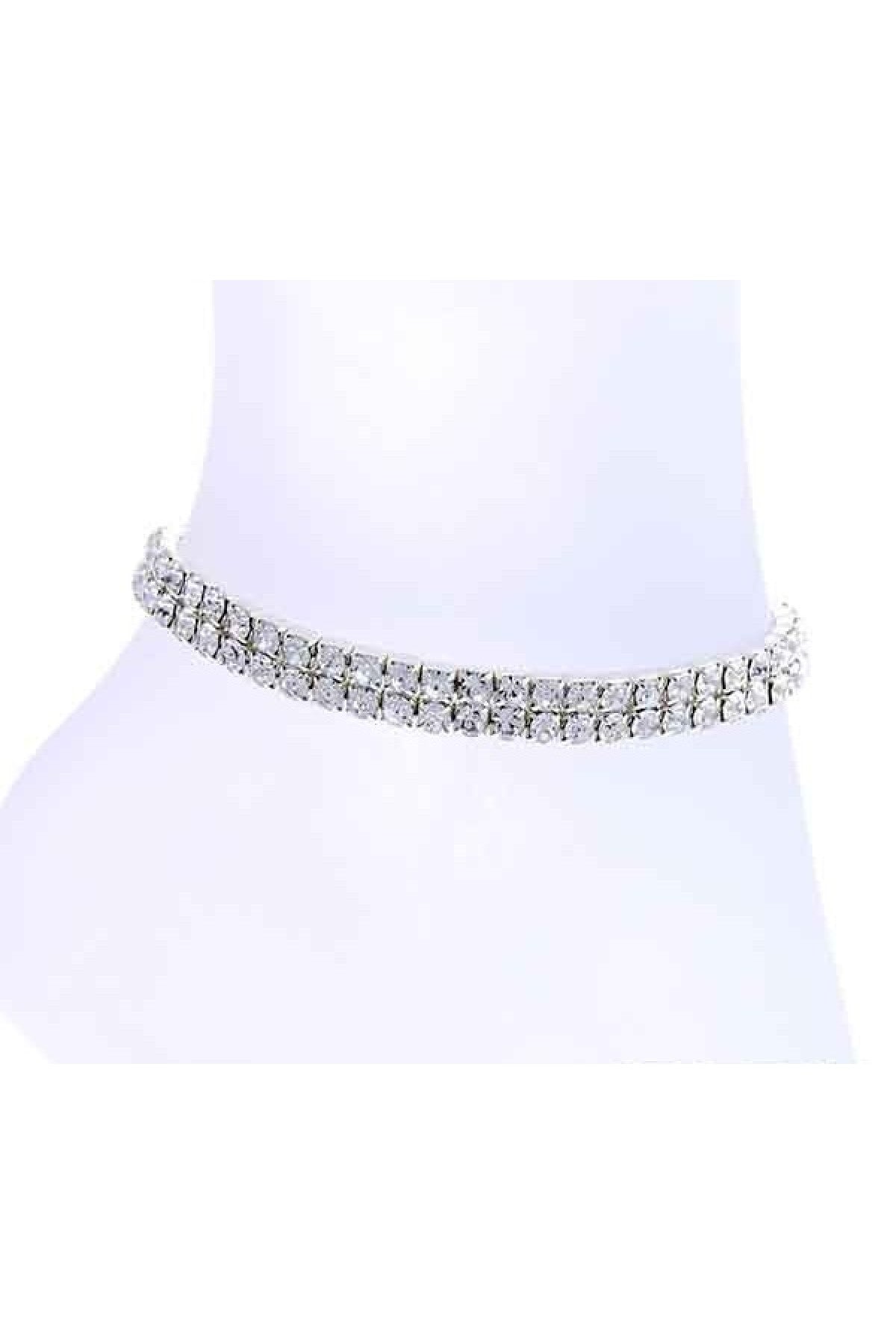 A stylish 2 lined crystal anklet with a stretch band, showcasing sparkling crystals on a delicate design.