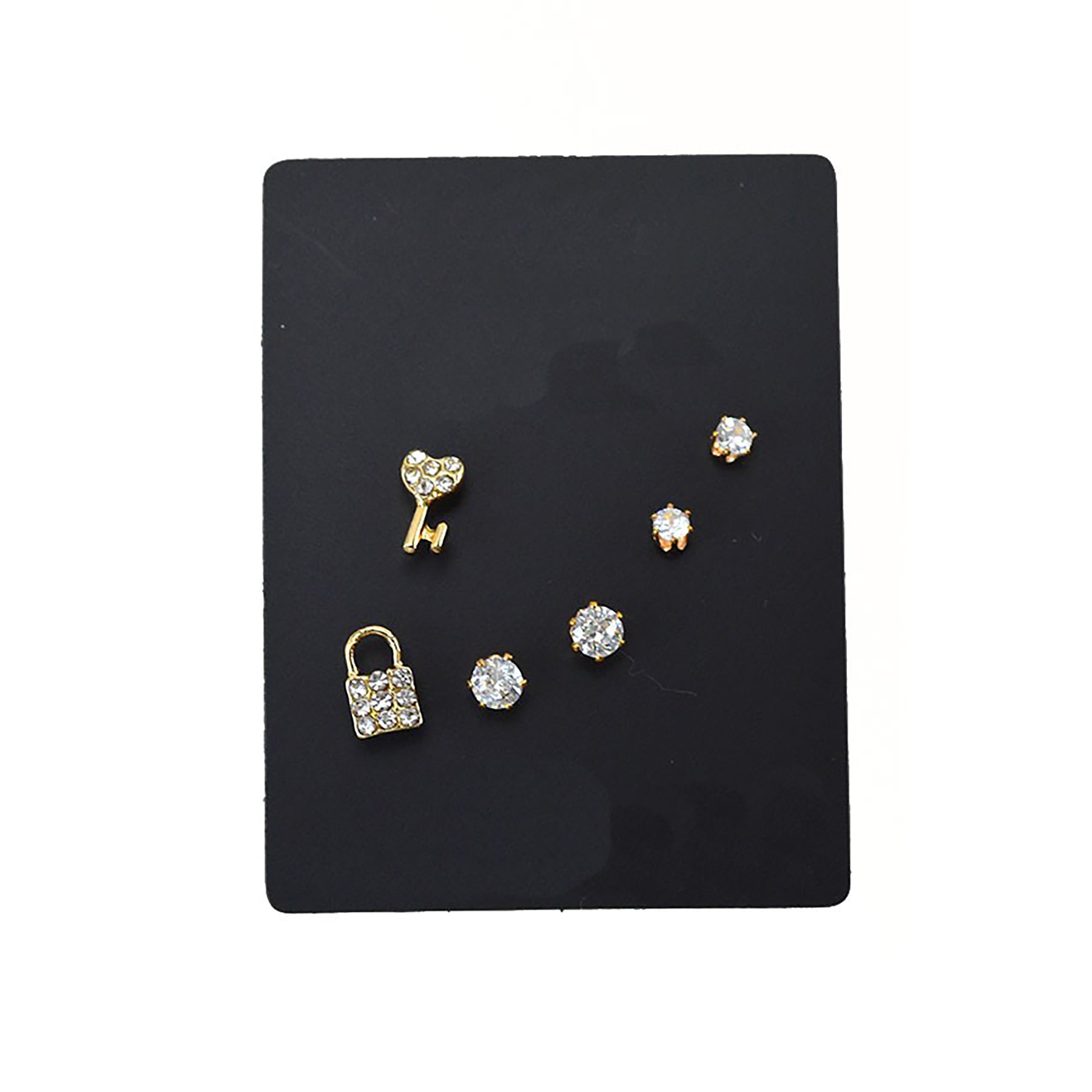 Three pairs of stylish stud earrings in various designs, showcasing their elegant and versatile nature.