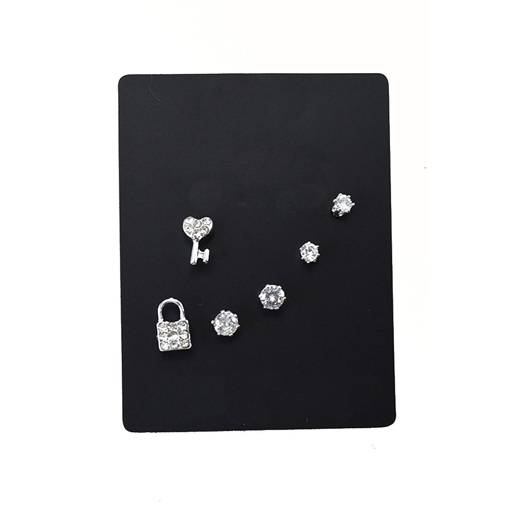 Three pairs of stylish stud earrings in various designs, showcasing their elegant and versatile nature.