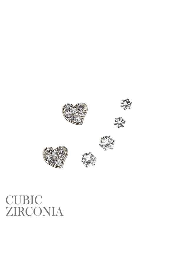 Three pairs of stylish stud earrings in various designs, showcasing their elegance and versatility.