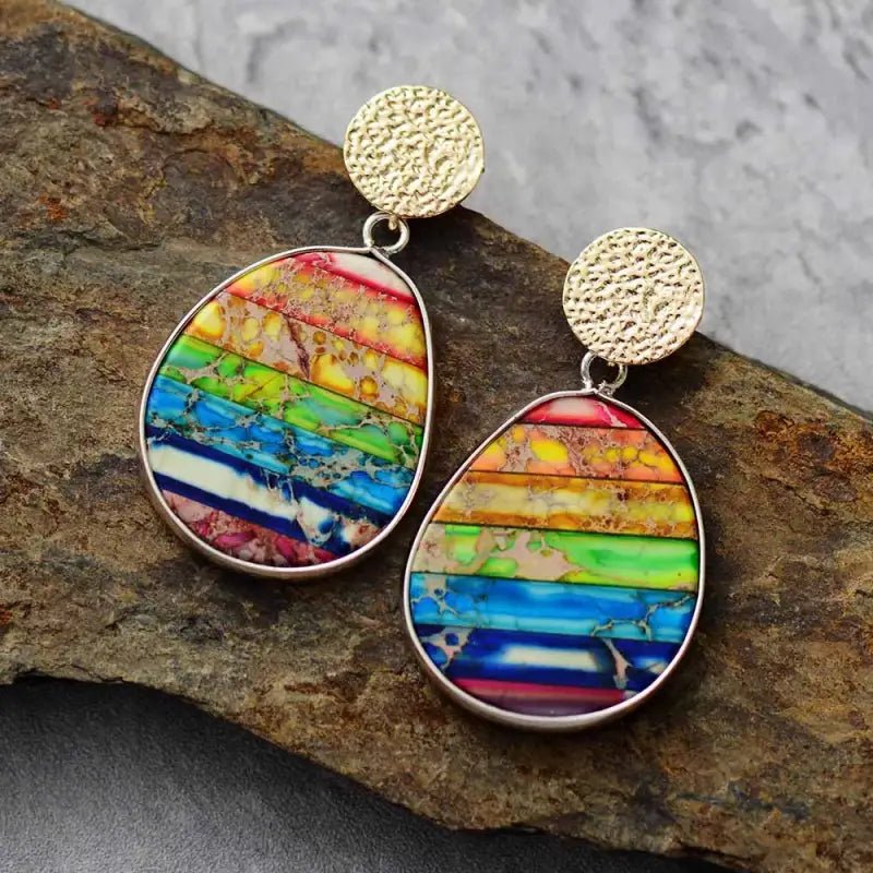 A pair of 7 Chakra Rainbow Earrings featuring vibrant Imperial Jasper stones, showcasing a bohemian style perfect for women.