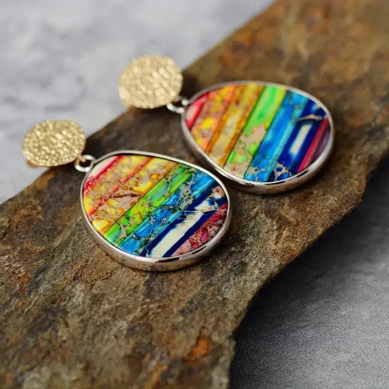 A pair of 7 Chakra Rainbow Earrings featuring vibrant Imperial Jasper stones, showcasing a bohemian style perfect for women.