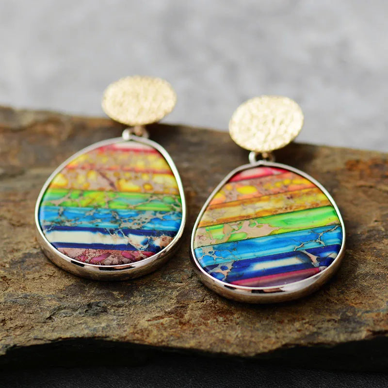 A pair of 7 Chakra Rainbow Earrings featuring vibrant Imperial Jasper stones, showcasing a bohemian style perfect for women.