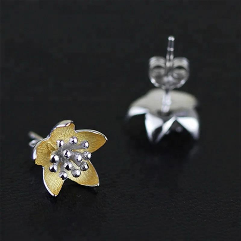 Elegant Adonis Stud Earrings featuring a flower design, crafted from 18K gold-plated sterling silver.