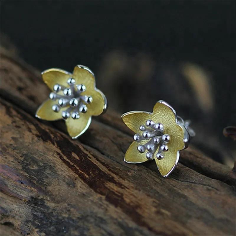 Elegant Adonis Stud Earrings featuring a flower design, crafted from 18K gold-plated sterling silver.