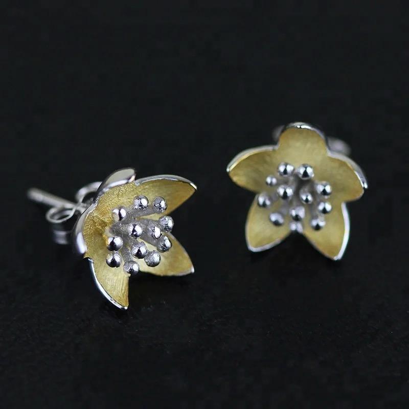 Elegant Adonis Stud Earrings featuring a flower design, crafted from 18K gold-plated sterling silver.