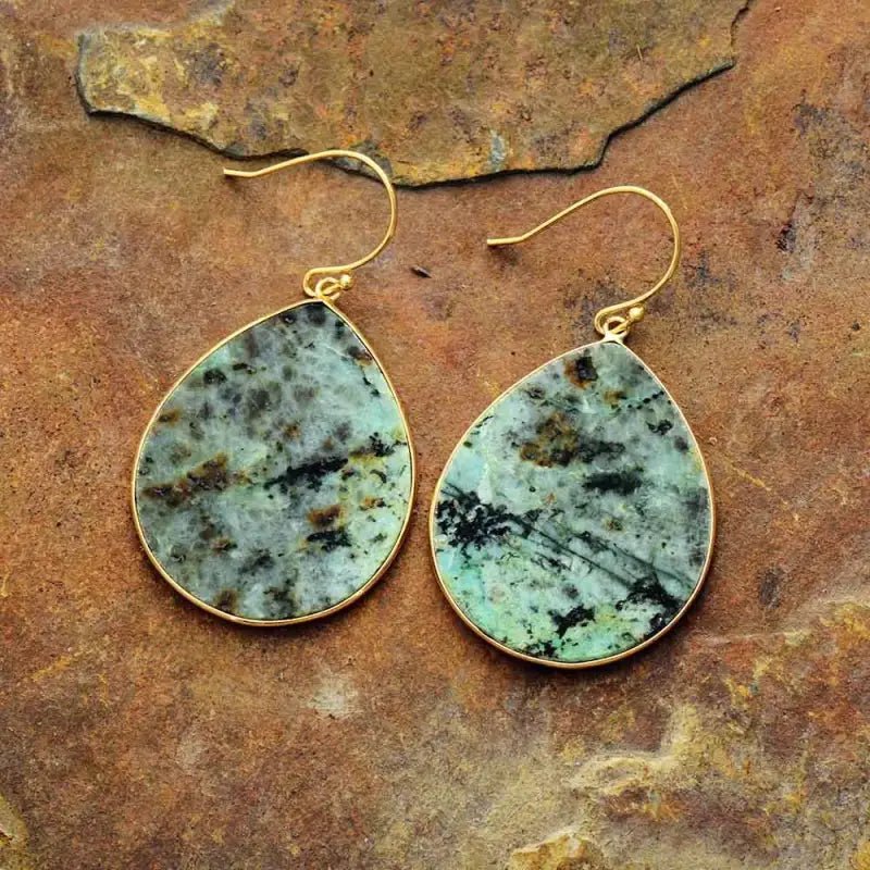 Elegant African Turquoise Dangle Earrings showcasing vibrant colors and natural stone beauty, perfect for bohemian style.