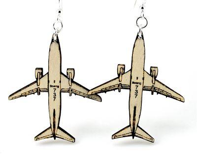 A pair of stylish airplane earrings made from sustainably sourced wood, featuring silver-finished stainless steel ear wires.